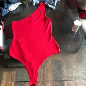 Red bodysuit.